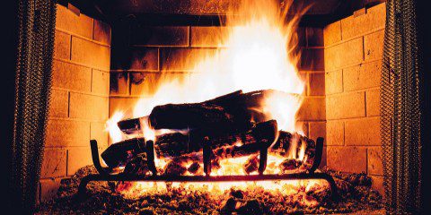 burning logs in a fireplace